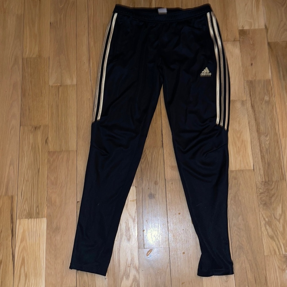 ADIDAS joggers with gold stripes
